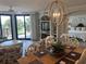 Comfortable living space adjoins the bedroom with balcony access, and a view of the outdoors at 371 S Dunes Dr., Pawleys Island, SC 29585