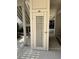 Exterior storage closet near the stairs with lattice door for added storage convenience at 371 S Dunes Dr., Pawleys Island, SC 29585