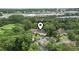 Aerial view of the apartment complex and the surrounding forest and trees at 405 Pipers Ln. # 405, Myrtle Beach, SC 29575