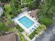 Aerial view of the fenced community pool and furniture for residents to enjoy at 405 Pipers Ln. # 405, Myrtle Beach, SC 29575