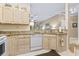 Kitchen featuring neutral cabinets, granite countertops and a pass through to the living room at 405 Pipers Ln. # 405, Myrtle Beach, SC 29575