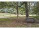 A peaceful setting with a park bench under the shade trees at 405 Pipers Ln. # 405, Myrtle Beach, SC 29575