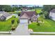 An attractive single-Gathering home with a spacious yard, mature landscaping, and a two-car attached garage at 405 Vintage Circle, Myrtle Beach, SC 29579