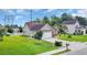 An attractive single-Gathering home with a spacious yard, mature landscaping, and a two-car attached garage at 405 Vintage Circle, Myrtle Beach, SC 29579