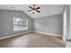 Bedroom featuring neutral walls, a ceiling fan, and wood-look floors at 405 Vintage Circle, Myrtle Beach, SC 29579