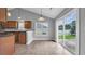 Bright dining area featuring tile floors, pendant lighting, and sliding glass door at 405 Vintage Circle, Myrtle Beach, SC 29579