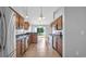Well-equipped kitchen featuring stainless steel appliances, granite countertops, and wood cabinetry at 405 Vintage Circle, Myrtle Beach, SC 29579