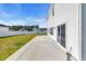 Spacious backyard featuring a white fence, patio, and a grass lawn at 4115 Bayhill St., Myrtle Beach, SC 29579