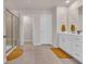 Bright bathroom with a glass shower, double vanity, and tile flooring at 4115 Bayhill St., Myrtle Beach, SC 29579