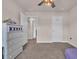 Bedroom featuring carpet, a ceiling fan, and a storage cabinet at 4115 Bayhill St., Myrtle Beach, SC 29579