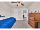 Bedroom with carpet, a ceiling fan, and view into another room at 4115 Bayhill St., Myrtle Beach, SC 29579