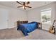 Bedroom featuring carpet, a window, and an accent guitar at 4115 Bayhill St., Myrtle Beach, SC 29579