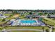 Community pool area featuring a large pool, comfortable lounge chairs, and inviting umbrellas for residents to enjoy at 4115 Bayhill St., Myrtle Beach, SC 29579