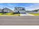 Beautiful two-story home showcasing a well-kept lawn, a double car garage and classic curb appeal on a sunny day at 4115 Bayhill St., Myrtle Beach, SC 29579