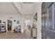 Inviting foyer with soaring ceilings, wood-look floors, and stylish decor, creating a warm and welcoming entrance at 4115 Bayhill St., Myrtle Beach, SC 29579