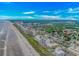 Stunning aerial view of the coastline with the beach, ocean, and high-rise buildings at 4309 Beverly Ct., North Myrtle Beach, SC 29582