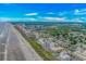 Stunning aerial view of the coastline with the beach, ocean, and high-rise buildings at 4309 Beverly Ct., North Myrtle Beach, SC 29582
