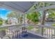 Relax on the spacious, covered balcony with seating and neighborhood views at 4309 Beverly Ct., North Myrtle Beach, SC 29582