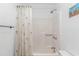 Bathroom with a shower-tub combo and palm tree shower curtain at 4309 Beverly Ct., North Myrtle Beach, SC 29582