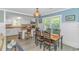 Open dining area adjacent to the kitchen, featuring a modern table set at 4309 Beverly Ct., North Myrtle Beach, SC 29582