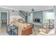 Comfortable living room with neutral decor, a fireplace, and staircase access at 4309 Beverly Ct., North Myrtle Beach, SC 29582