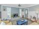 Stylish living room with a fireplace, blue accent wall, and comfortable seating at 4309 Beverly Ct., North Myrtle Beach, SC 29582