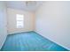 Bright bedroom with plush carpet and a large window for ample natural light at 434 Deer Path, Calabash, NC 28467