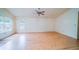 Spacious living room featuring hardwood flooring and bright windows at 434 Deer Path, Calabash, NC 28467