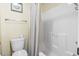 Clean bathroom featuring a bathtub, toilet, and a shower with a shower curtain at 45 Pinehurst Ln. # 2C, Pawleys Island, SC 29585