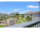Balcony view showcasing a resort style community with a pool and golf course at 4687 Wild Iris Dr. # 303, Myrtle Beach, SC 29577