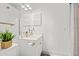 Clean bathroom with white vanity, stylish fixtures, and decor at 4687 Wild Iris Dr. # 303, Myrtle Beach, SC 29577