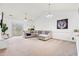 Spacious living room with vaulted ceilings and plush sectional sofa at 4687 Wild Iris Dr. # 303, Myrtle Beach, SC 29577