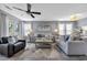 Inviting living room with comfortable seating, a ceiling fan, and natural light at 5040 Windsor Green Way # 204, Myrtle Beach, SC 29579