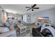 Spacious living room featuring comfortable seating, a ceiling fan, and an open floor plan at 5040 Windsor Green Way # 204, Myrtle Beach, SC 29579