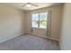 Inviting bedroom with a ceiling fan, soft carpet and a window for ample natural light at 506 Hogwart Ln., Longs, SC 29568