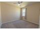 A cozy bedroom with a carpeted floor and a window that provides plenty of natural light at 506 Hogwart Ln., Longs, SC 29568