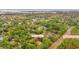 Overhead shot of property surrounded by lush greenery in a tranquil neighborhood near Brookgreen Gardens at 5074 Cowart Ct., Murrells Inlet, SC 29576