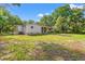 Spacious backyard featuring a covered patio, offering plenty of room for outdoor activities and relaxation at 5074 Cowart Ct., Murrells Inlet, SC 29576