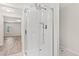 Modern bathroom featuring a glass-enclosed shower and neutral color palette at 5074 Cowart Ct., Murrells Inlet, SC 29576