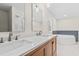 Elegant bathroom with double sinks, soaking tub, and stylish fixtures at 5074 Cowart Ct., Murrells Inlet, SC 29576