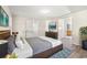 Staged bedroom with hardwood floors and modern decor at 5074 Cowart Ct., Murrells Inlet, SC 29576