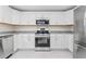 Updated kitchen showcasing stainless steel appliances, granite countertops and ample storage at 5074 Cowart Ct., Murrells Inlet, SC 29576