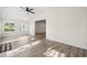 Bright living room with many windows providing tons of natural light at 5074 Cowart Ct., Murrells Inlet, SC 29576