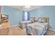 Comfortable bedroom featuring two twin beds with nautical-themed bedding and light blue walls at 556 White River Dr. # 44F, Myrtle Beach, SC 29579