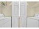Laundry area with large washer and dryer at 556 White River Dr. # 44F, Myrtle Beach, SC 29579