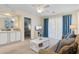 Cozy living room with a plush sofa, stylish coffee table, and a view of bedroom and patio at 556 White River Dr. # 44F, Myrtle Beach, SC 29579