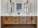Modern bathroom featuring a double vanity with stylish mirrors, fixtures, and chic decor at 573 S Dunes Dr., Pawleys Island, SC 29585