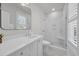 Modern bathroom with white subway tile shower and sleek vanity at 573 S Dunes Dr., Pawleys Island, SC 29585