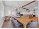 Open dining area with ample light, seamlessly connects to the kitchen and living area at 573 S Dunes Dr., Pawleys Island, SC 29585