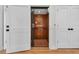 Residential elevator with wooden interior, providing easy access between floors within the home at 573 S Dunes Dr., Pawleys Island, SC 29585